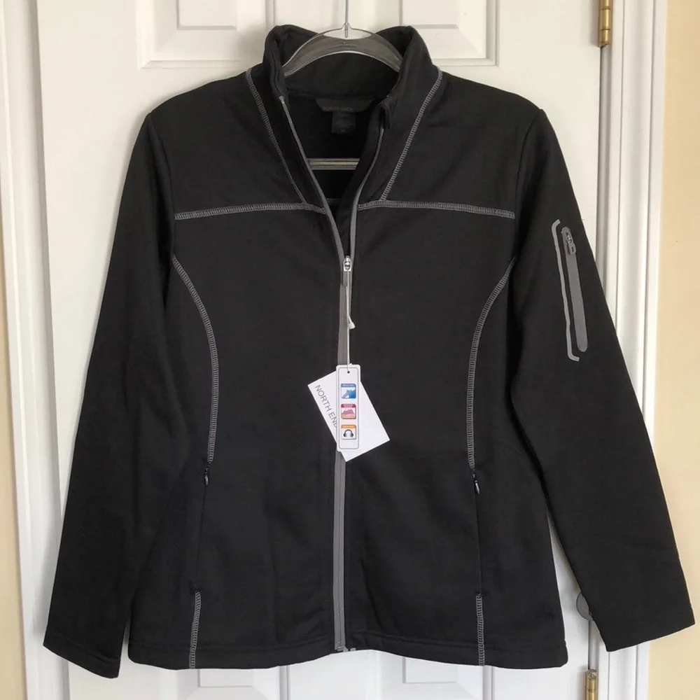 New Women’s North End lightweight jacket.  Size S.  Reflective strips. Black.